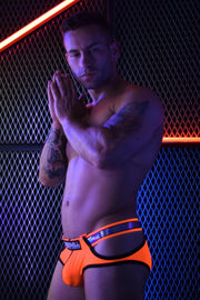 BREEDWELL REFLECTOR UV BLACKLIGHT BRIEFS WITH TWO D-RINGS NEON ORANGE 29 - SexyMenUnderwear.com