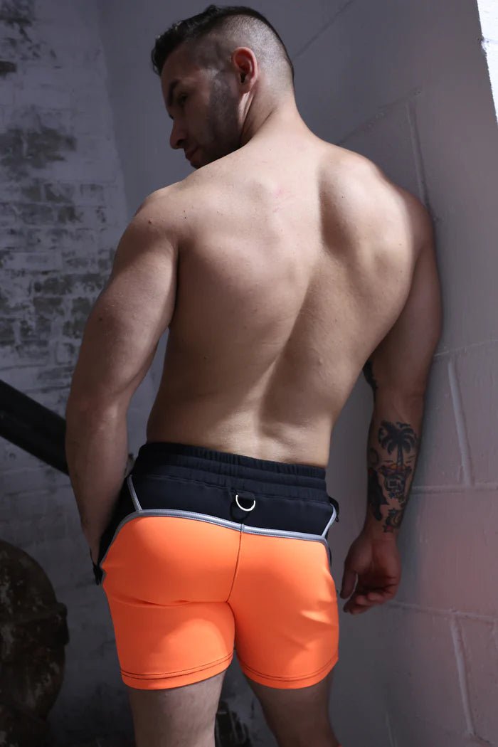 BREEDWELL Swimwear AKIRA Blacklight UV Reflective Neon Orange Swim Shorts - SexyMenUnderwear.com